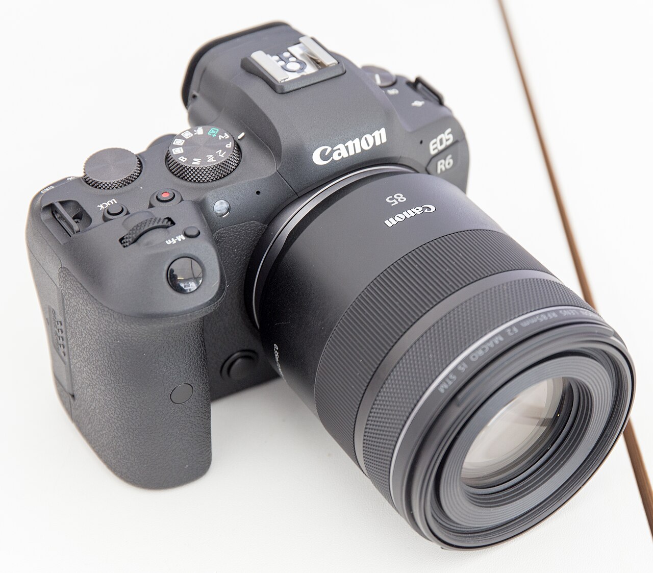 Canon EOS R6 full-frame mirrorless camera body with RF 85mm F2 Macro lens, official product photo