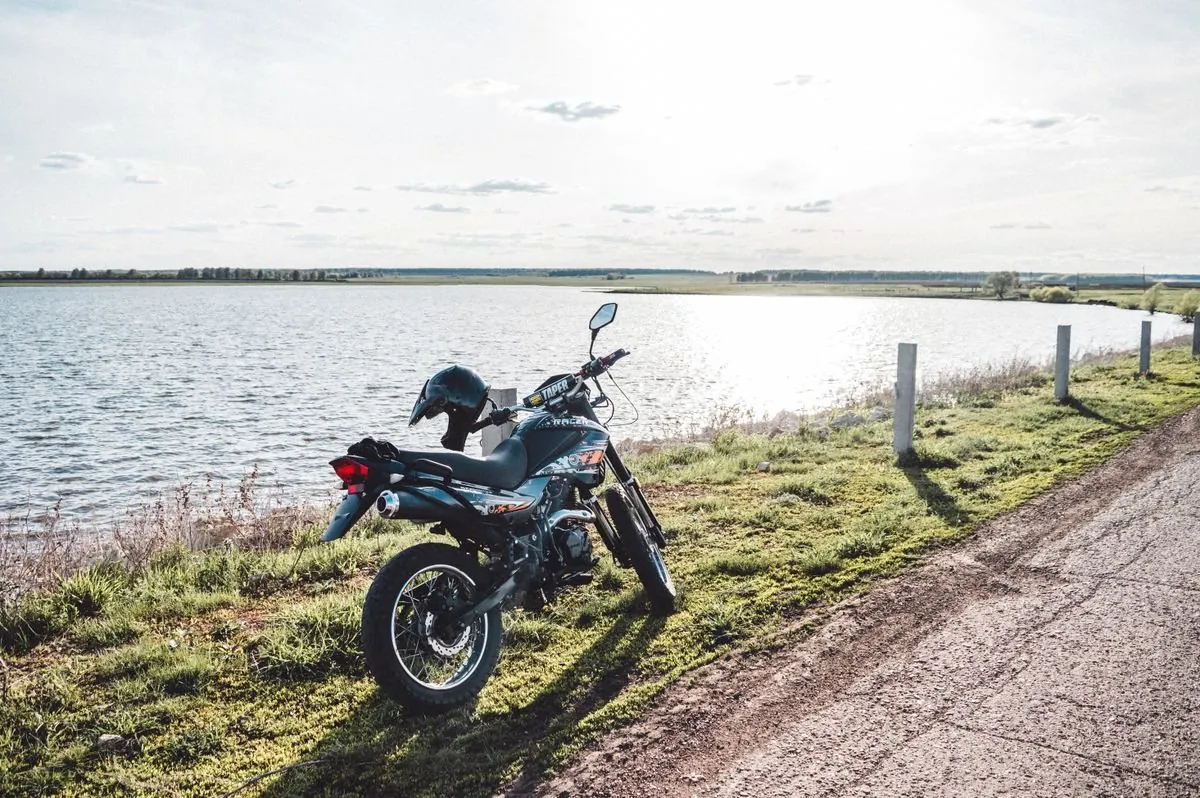 White touring motorcycle on Highway 28 through Algonquin Park