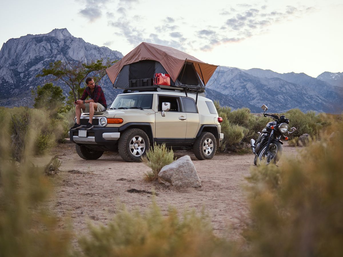 Motorcycle touring with packed luggage showing saddlebags and touring setup