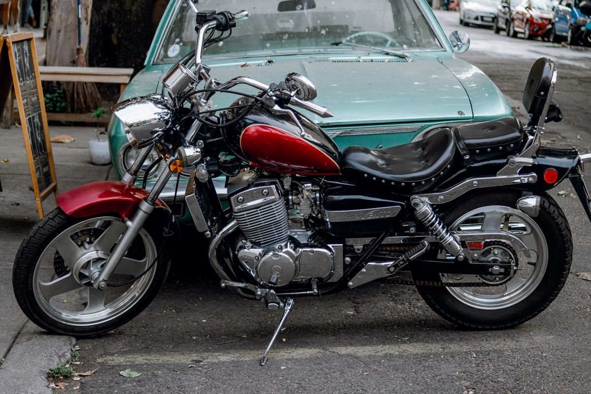 Indian Pursuit touring motorcycle showing the heavy bagger bike at low speed in a parking environment