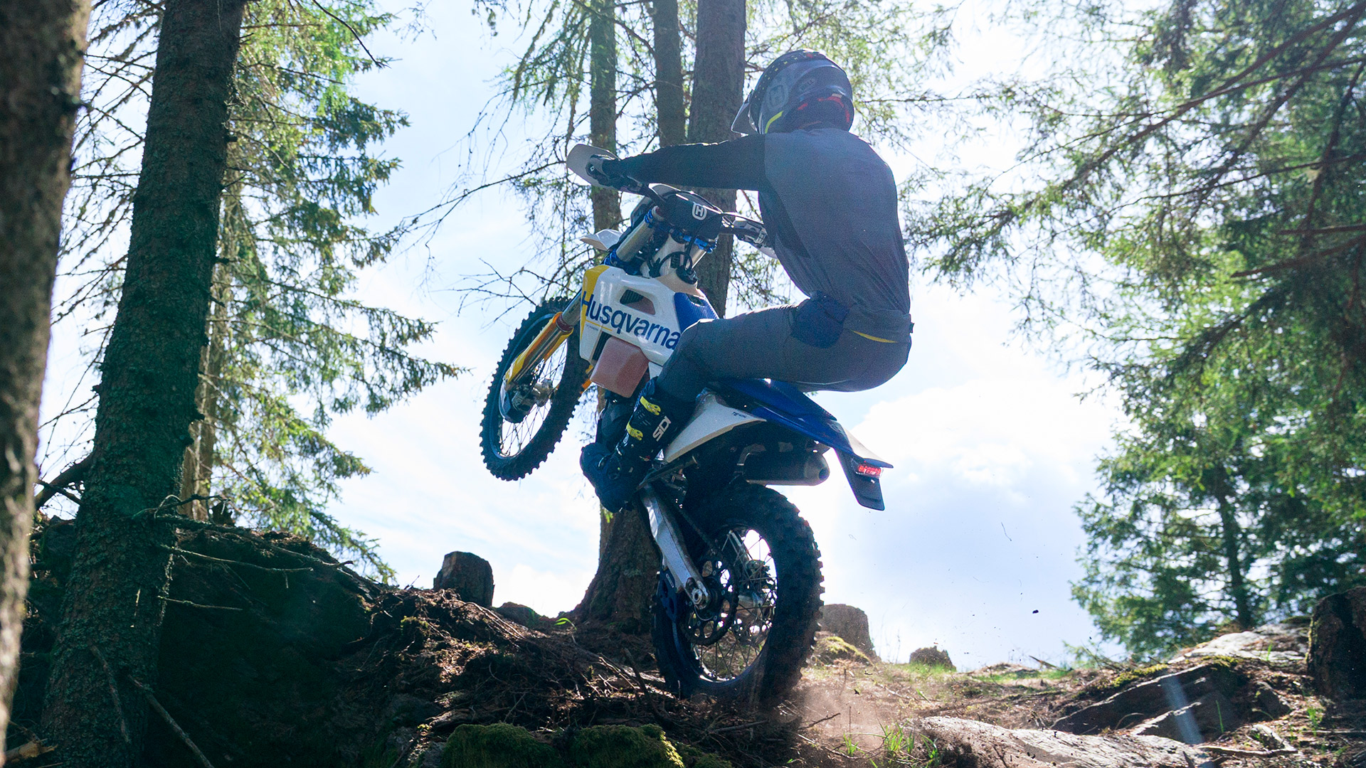 Husqvarna TE 300 off-road motorcycle parked on a trail, the type affected by the 2026 rear brake caliper recall