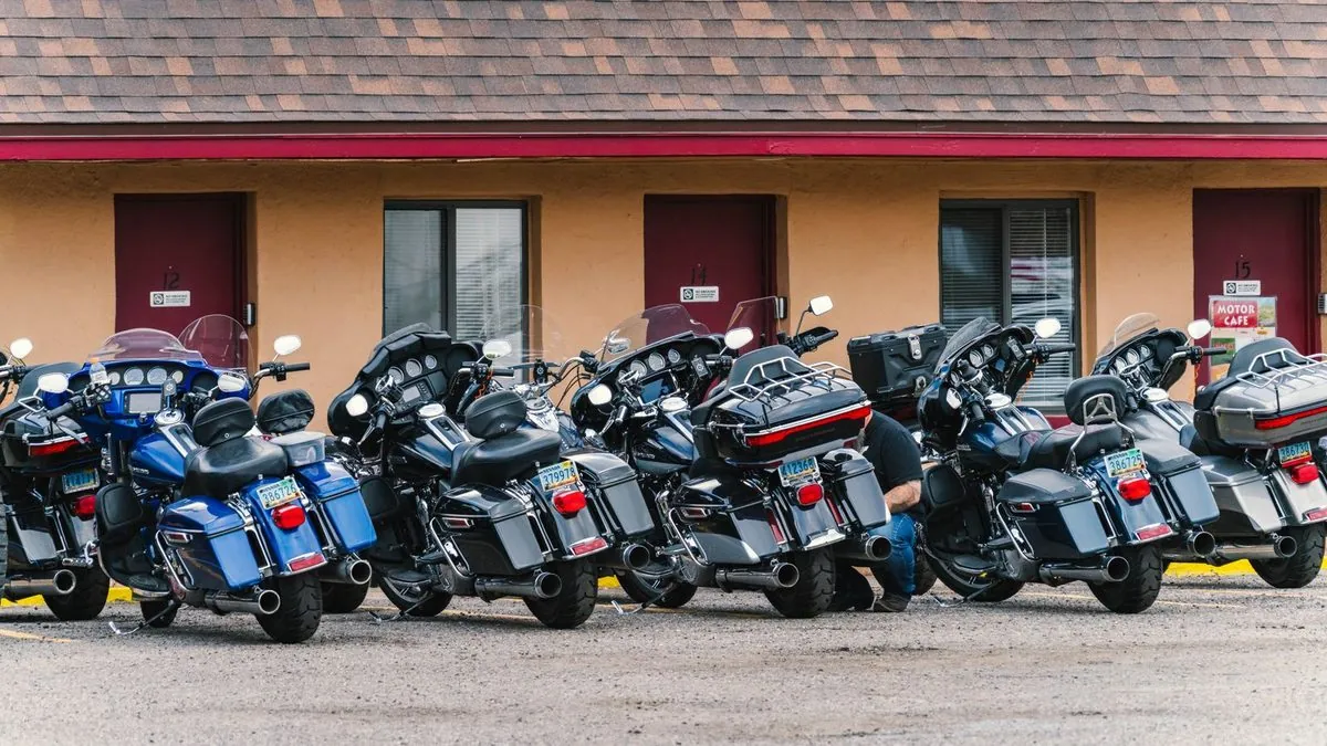 Motorcycle touring on a Canadian highway showing long-distance riding with luggage