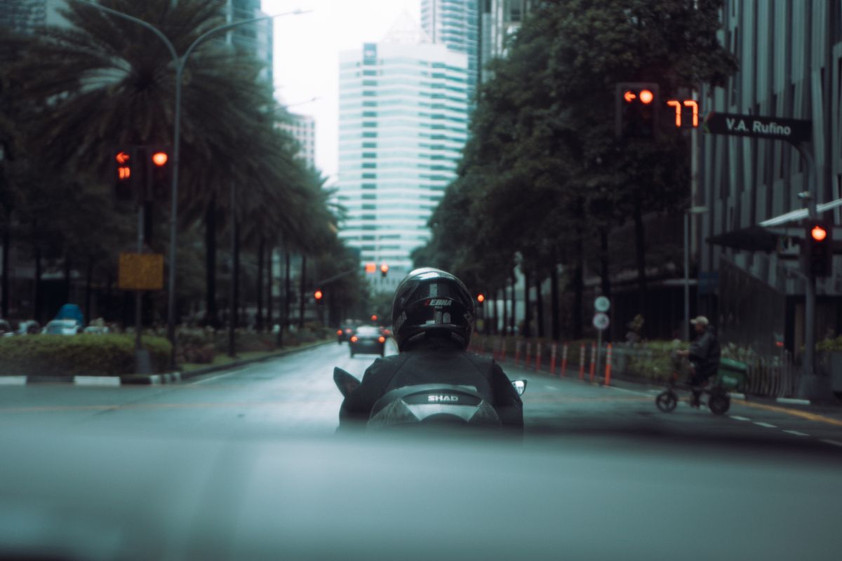 Action camera mounted on motorcycle helmet