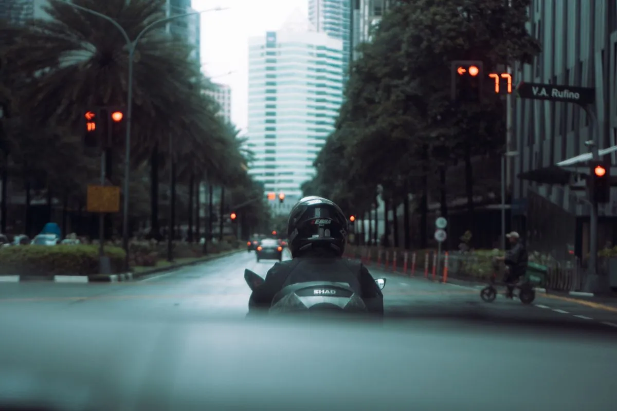 Action camera mounted on motorcycle helmet