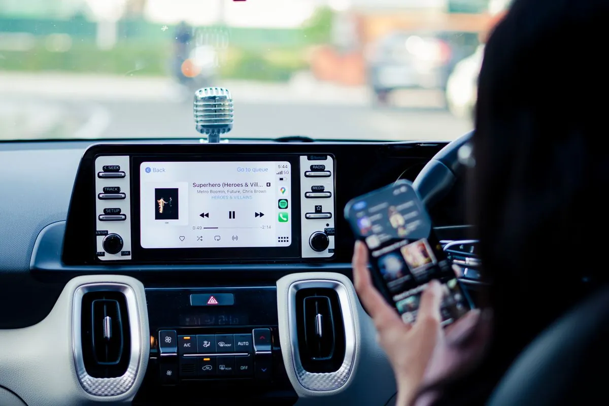 Car dashboard screen with CarPlay navigation