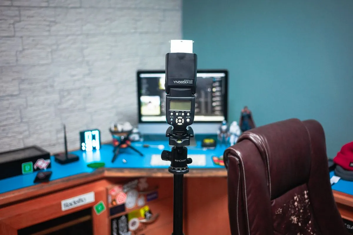 Content creator desk setup with monitor camera and lighting