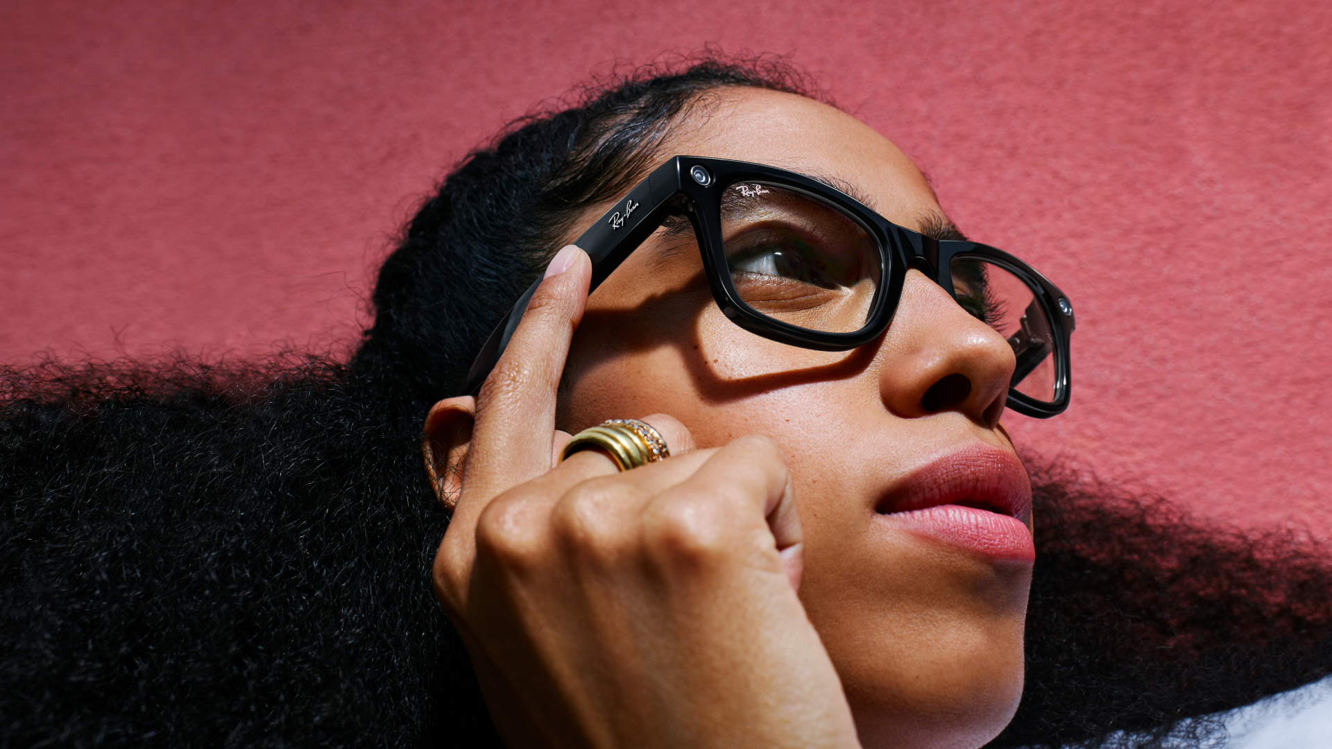 Ray-Ban Meta smart glasses showing the camera lens and temple-mounted controls for first-person video capture