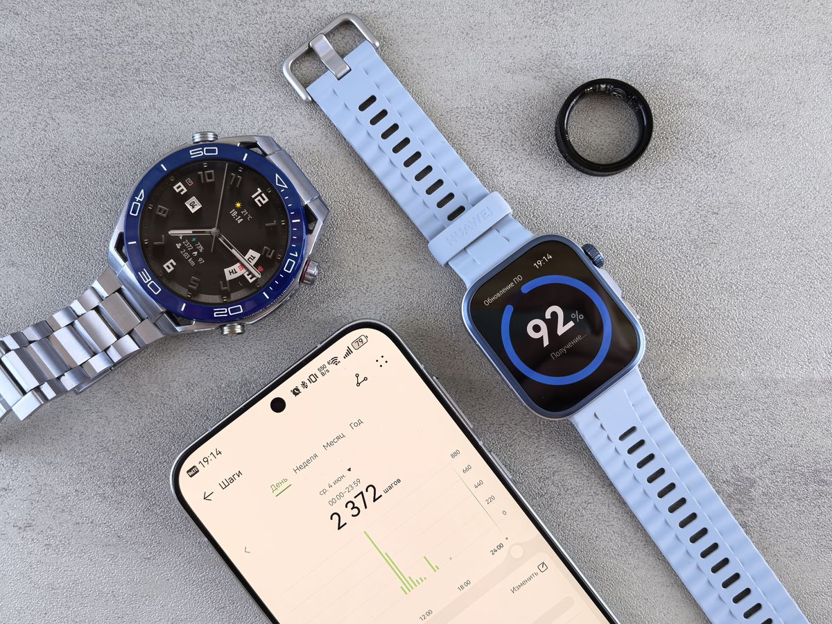Smartwatch and ring fitness tracker comparison on phone