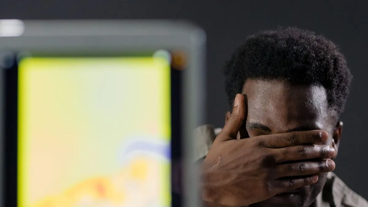 Person using a thermal imaging camera